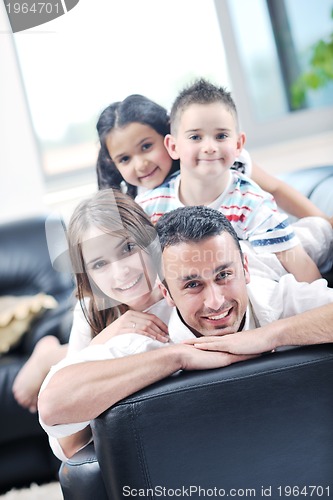 Image of young family at home