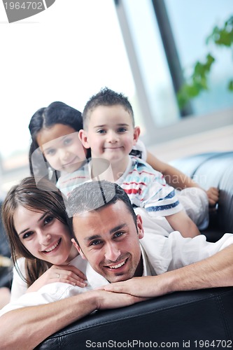 Image of young family at home