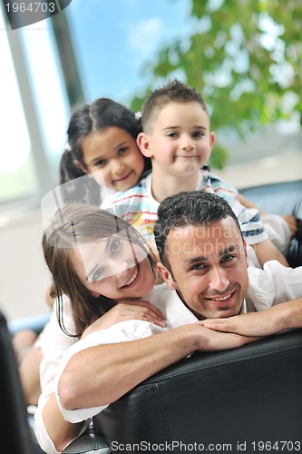 Image of young family at home