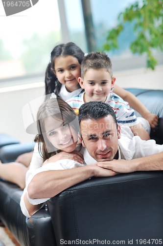 Image of young family at home