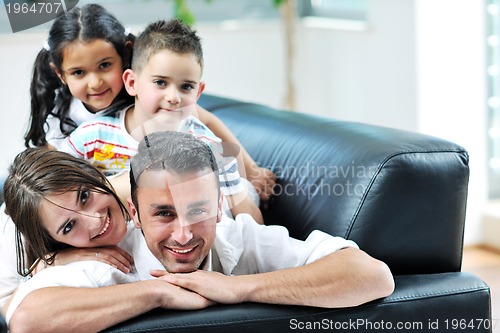 Image of young family at home