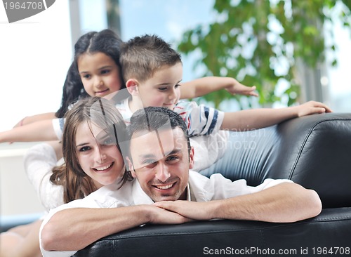 Image of young family at home