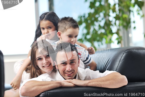 Image of young family at home