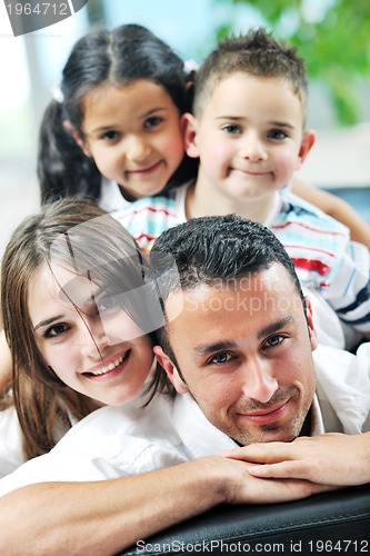 Image of young family at home