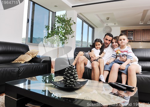 Image of young family at home