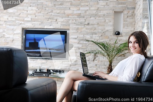 Image of girl work on laptop at home