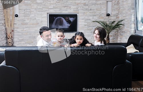 Image of young family at home