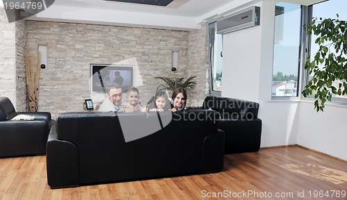 Image of young family at home