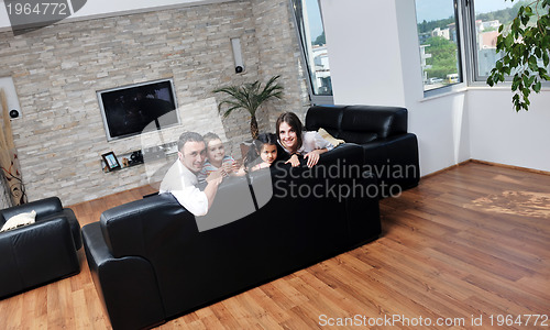 Image of young family at home