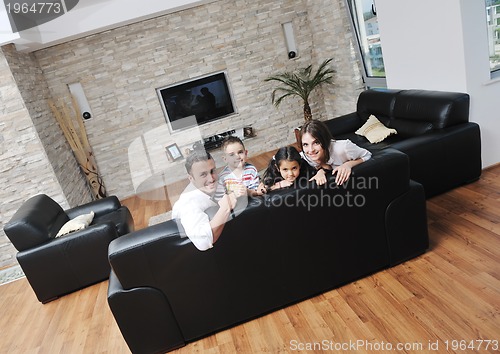 Image of young family at home