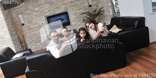 Image of young family at home