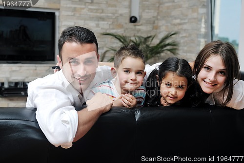 Image of young family at home