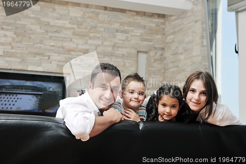 Image of young family at home