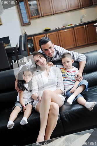 Image of young family at home