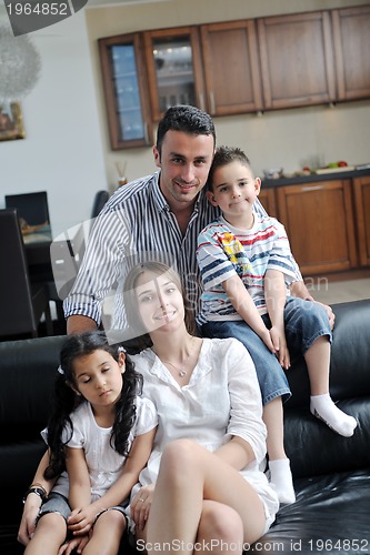 Image of young family at home