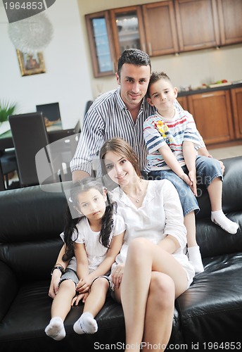 Image of young family at home