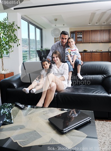 Image of young family at home