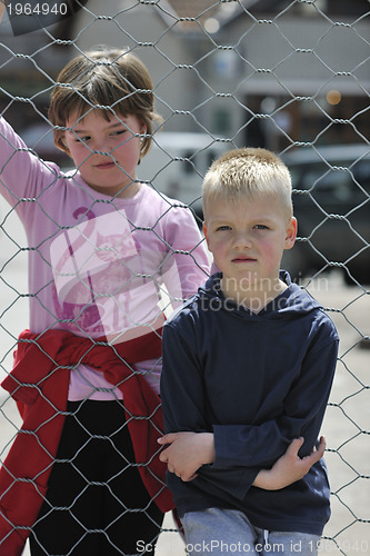 Image of brother and sister outdoor portrait