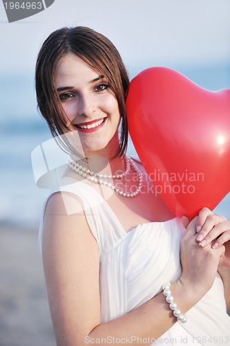 Image of romantic beach wedding at sunset