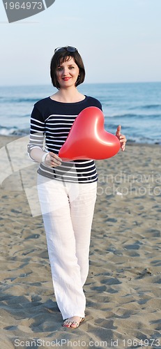 Image of young woman relax  on beach