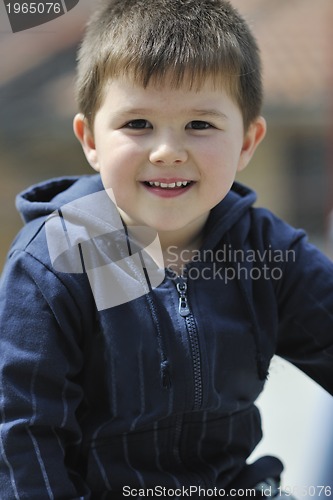 Image of little boy ride bicycle