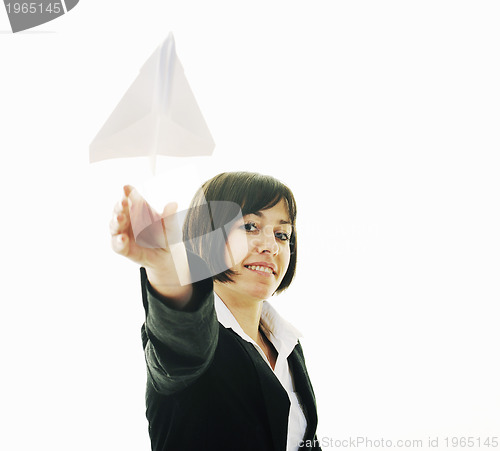 Image of business woman throwing  paper airplane 