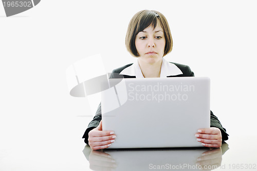 Image of business woman working on laptop