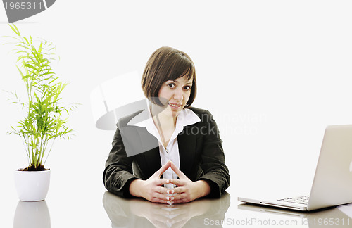 Image of business woman working on laptop