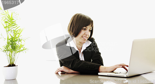 Image of business woman working on laptop
