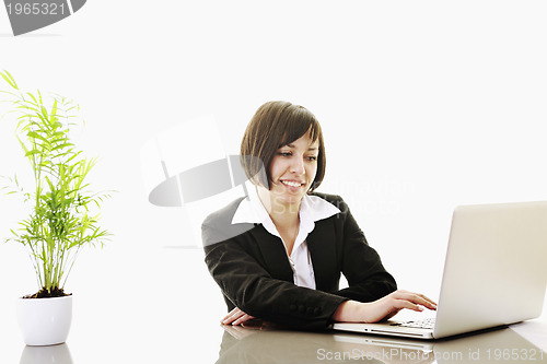 Image of business woman working on laptop