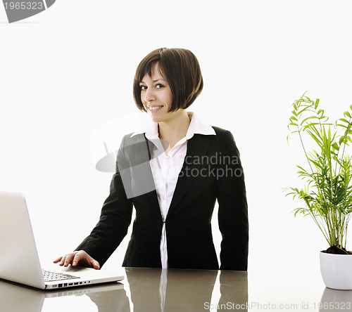 Image of business woman working on laptop