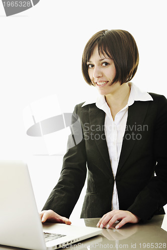 Image of business woman working on laptop