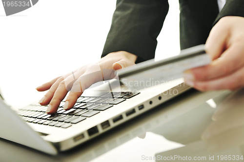 Image of business woman making online money transaction