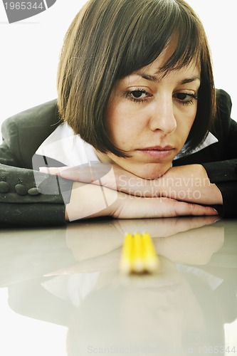 Image of bosiness woman choosing perfect pencil