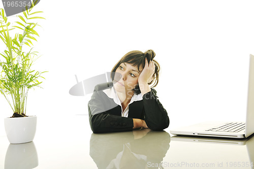 Image of business woman working on laptop