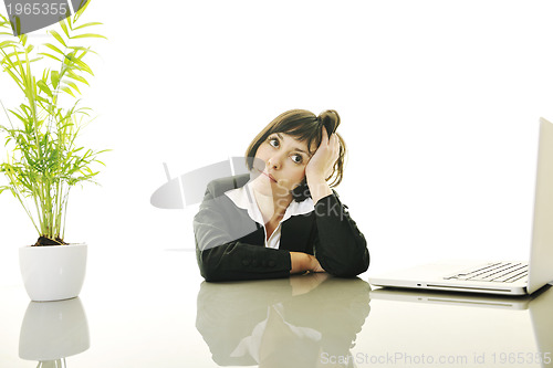 Image of business woman working on laptop