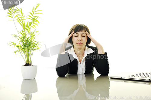 Image of business woman working on laptop