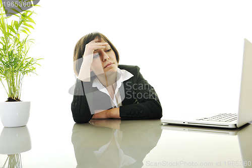 Image of business woman working on laptop