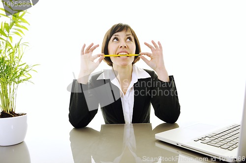 Image of business woman working on laptop