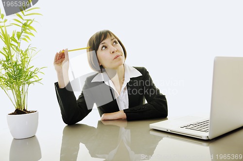 Image of business woman working on laptop