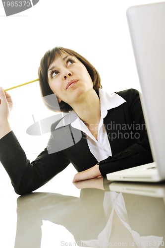 Image of business woman working on laptop