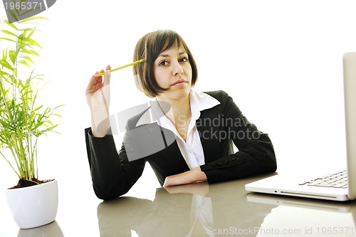 Image of business woman working on laptop
