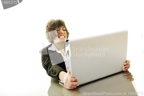 Image of business woman working on laptop