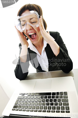 Image of business woman working on laptop