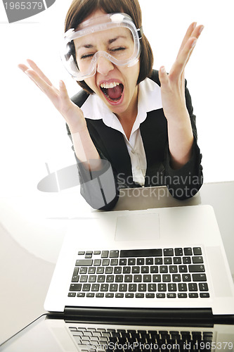 Image of business woman working on laptop
