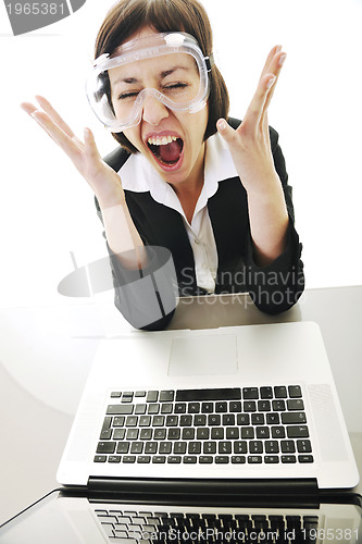 Image of business woman working on laptop