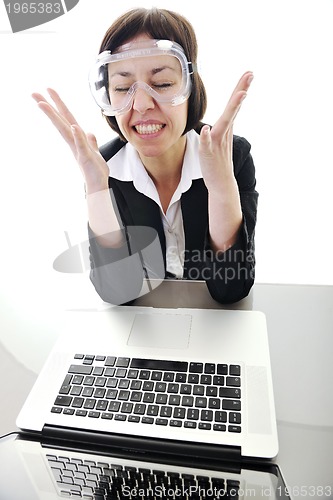 Image of business woman working on laptop