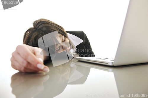 Image of business woman working on laptop