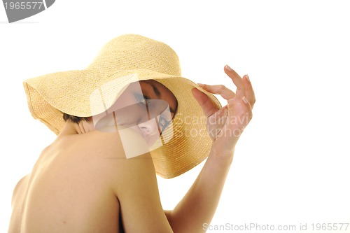 Image of yong woman with summer hat