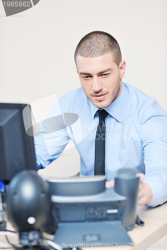 Image of businessman with a headset